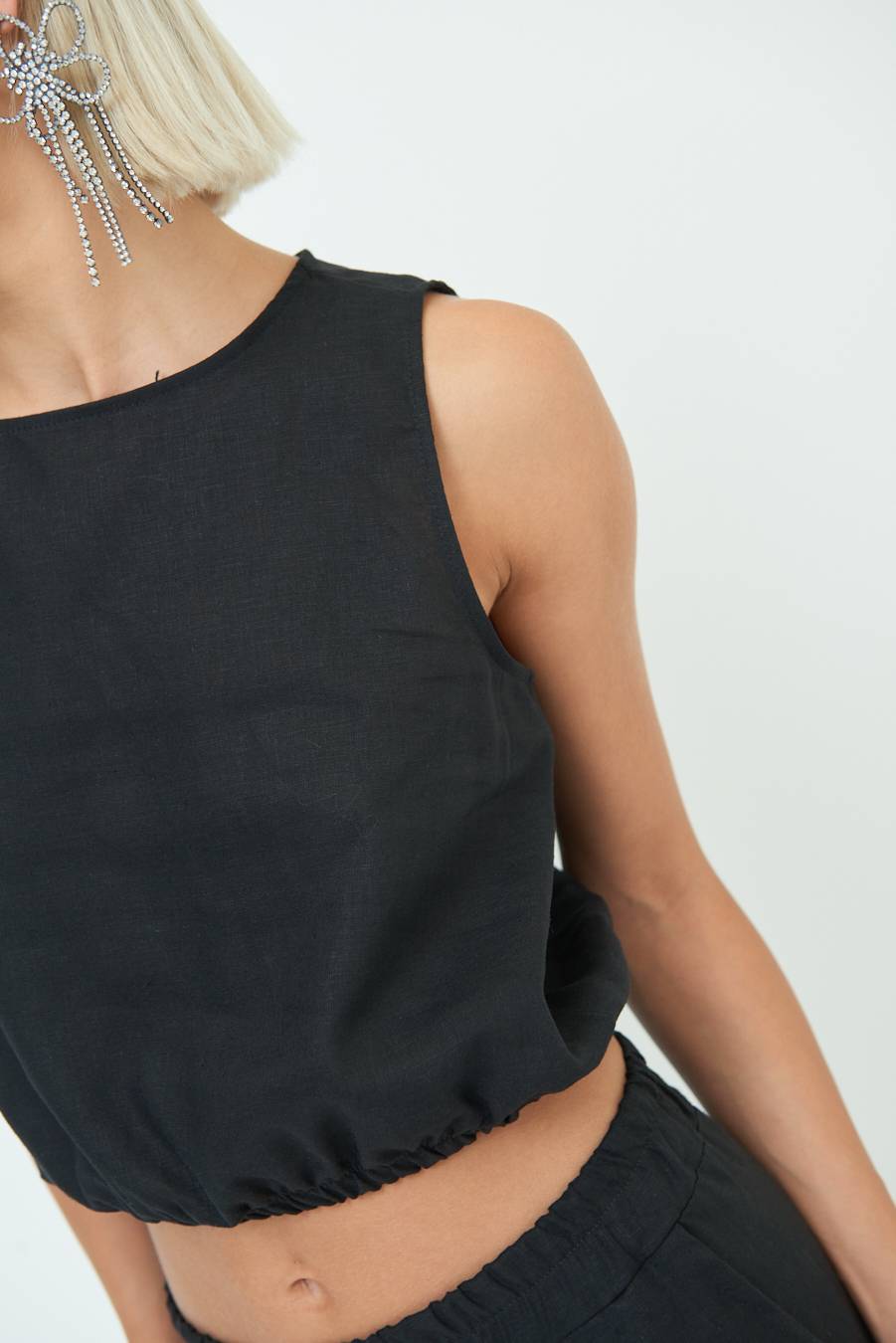 Kikisix TOP CORTO CON ELASTICO NERO Consegna Veloce