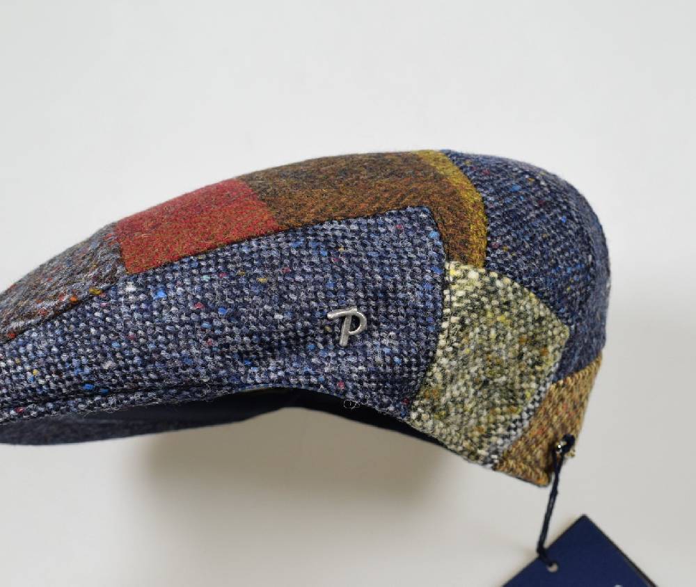 Panizza Berretto panizza blu a patchwork in lana donegal tweed Convenienza