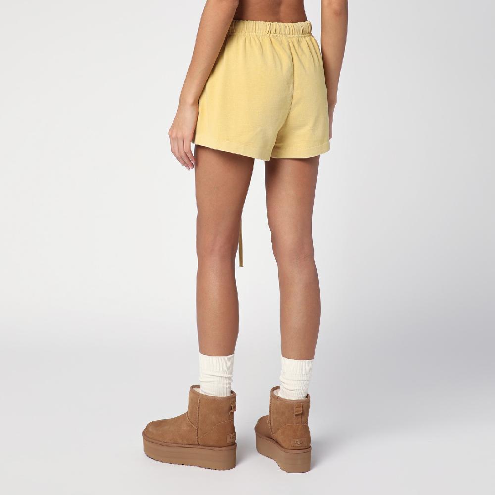 Fear of God Essentials Short color ambra con logo Acquista Ora