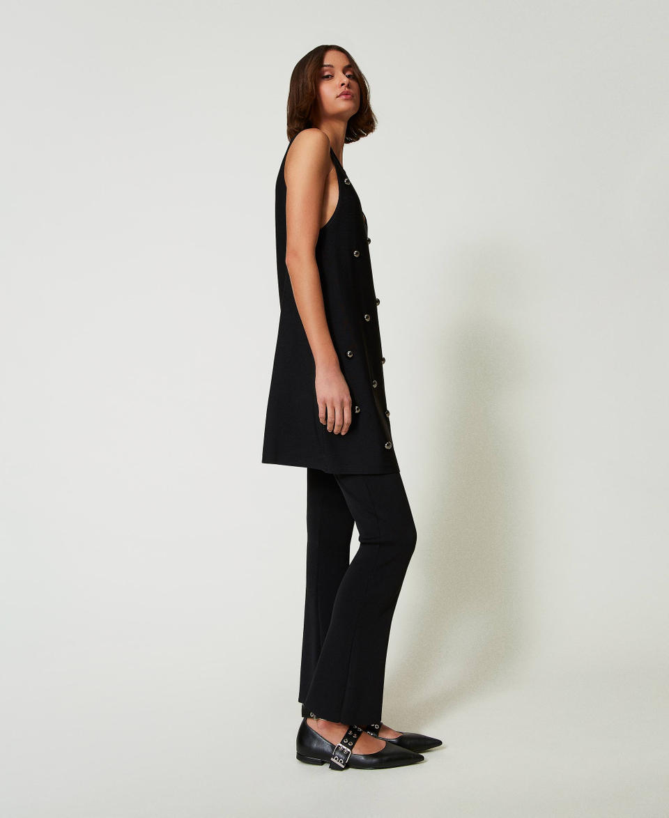 Twin Set Pantaloni flare in maglia Grande vendita