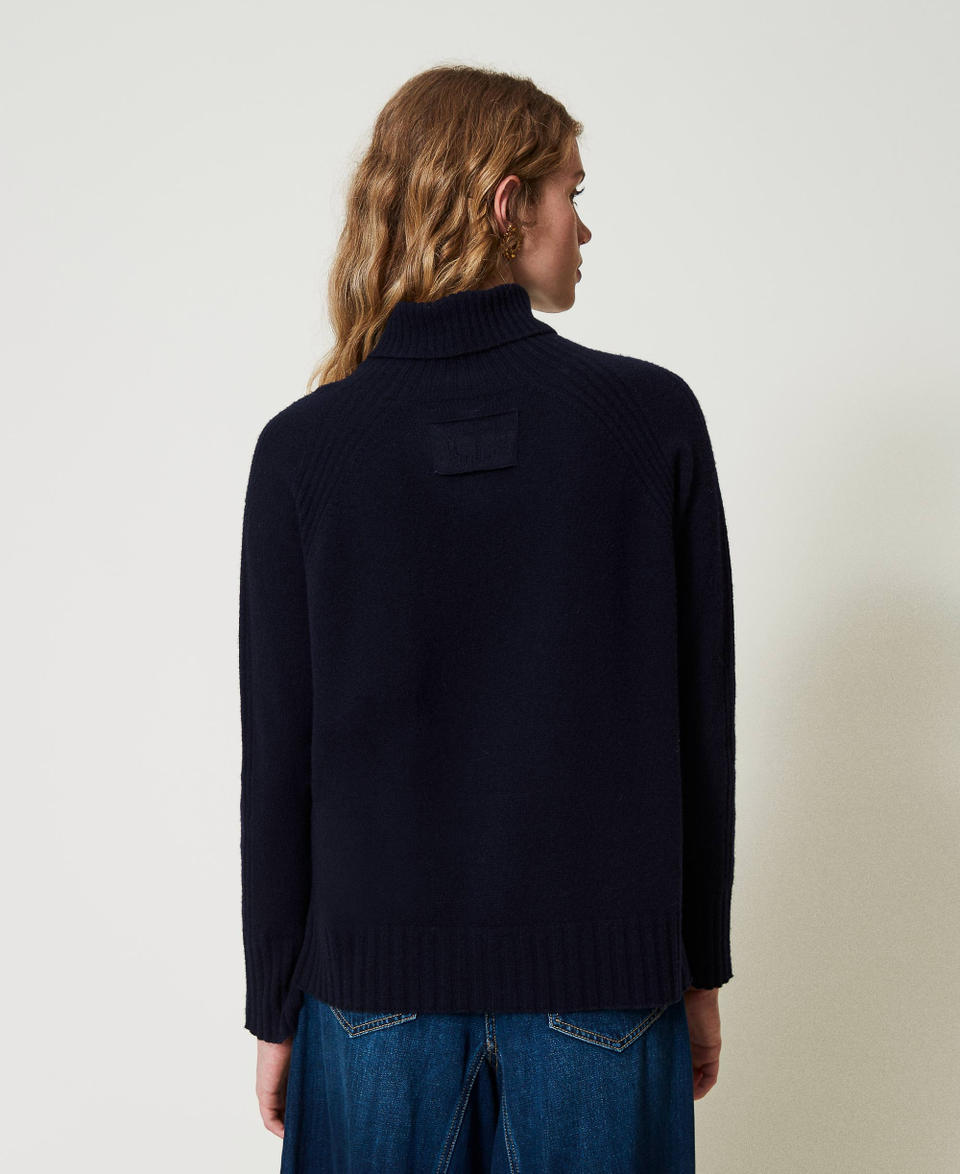 Twin Set Maglia dolcevita in lana e cashmere Sostegno trimestrale