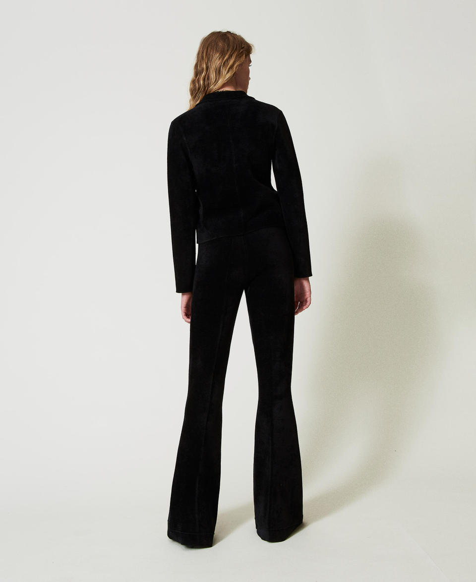 Twin Set Pantaloni flare in maglia con bottoni Oval T Sostegno trimestrale